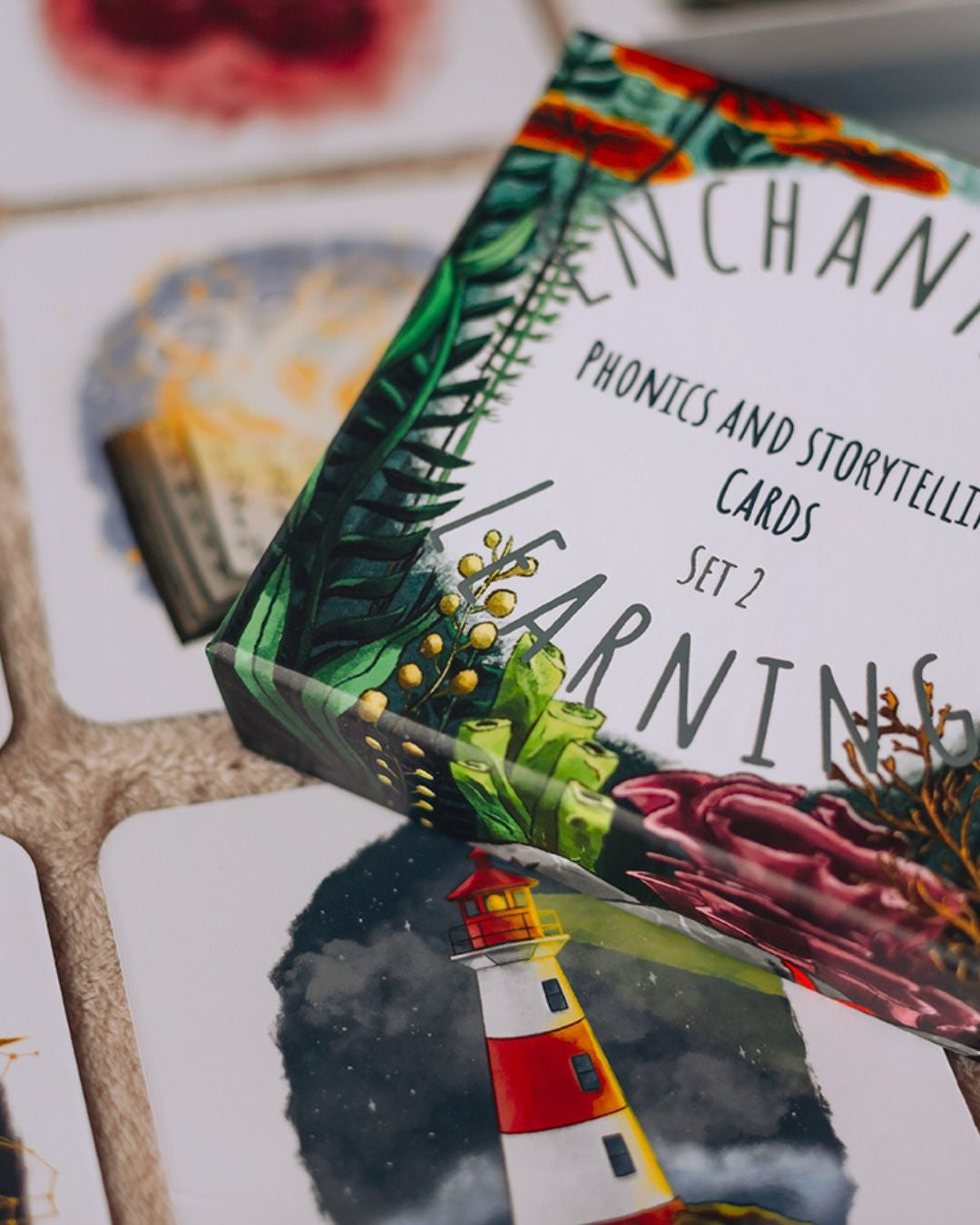 Close up of ocean themed box detail on phonics and storytelling cards, set two.