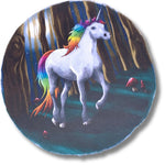Rainbow unicorn in nightime woodland scene.