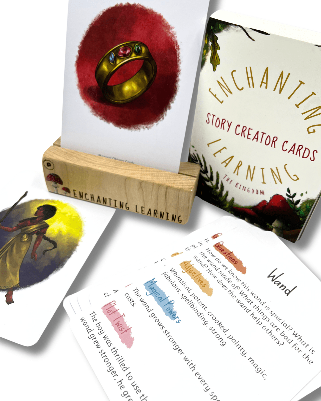 Selection of creative writing story cards for kids with card showing a ring in a wooden card stand