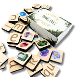 A pile of wooden phonics tiles.