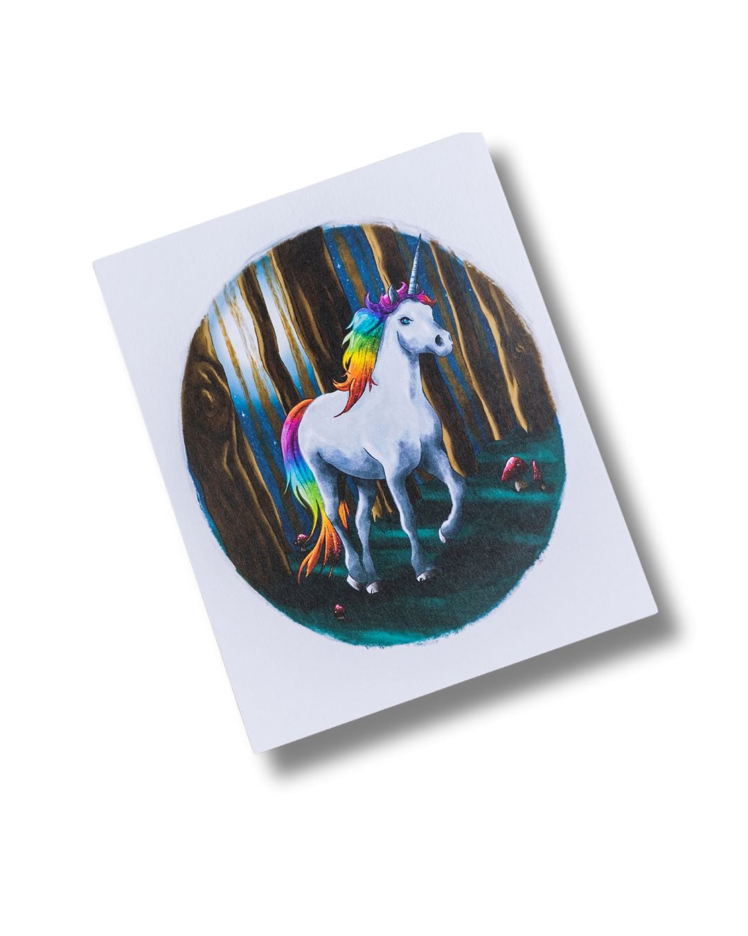 Small unicorn print set in an oval vignette.