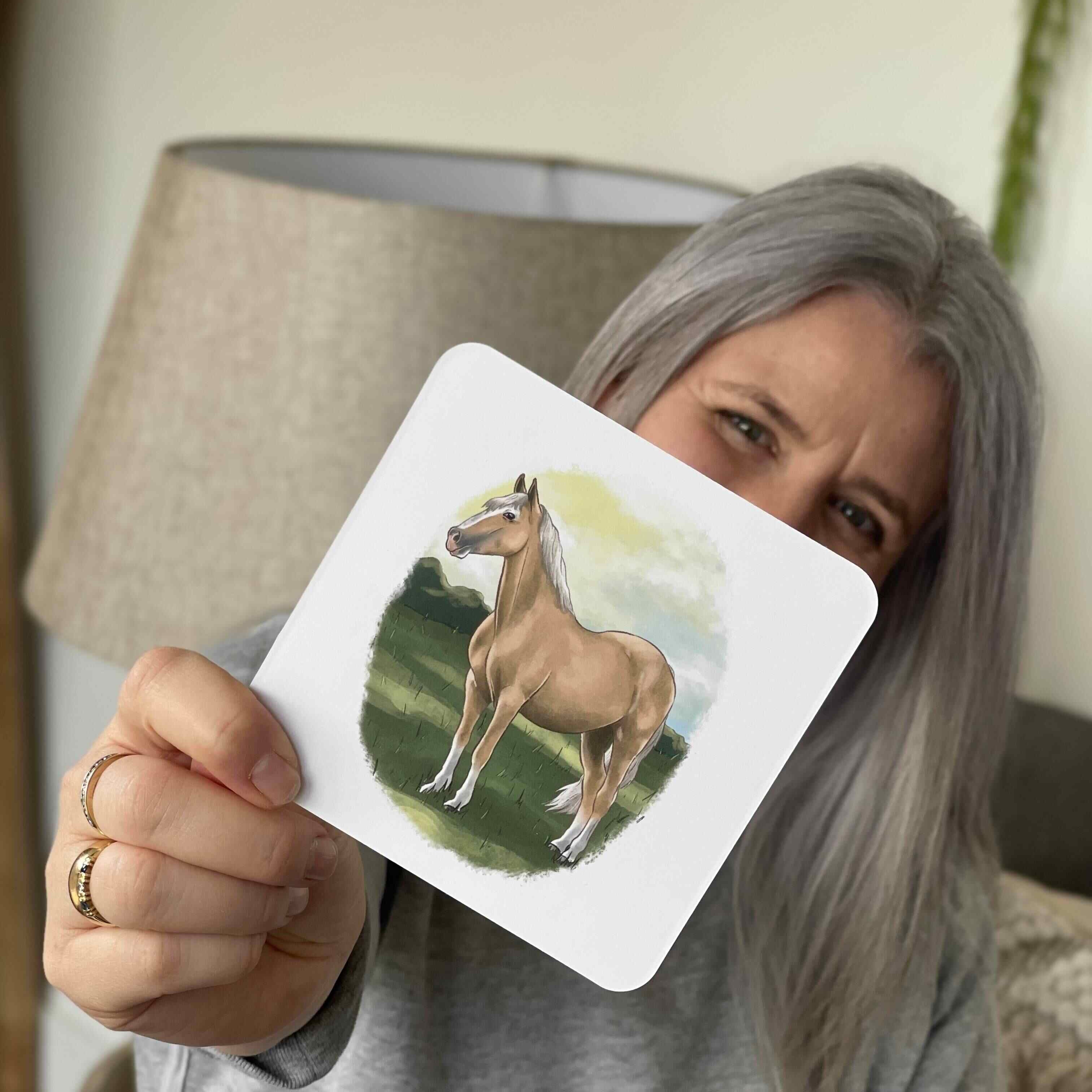 The Phive founder holding horse phonics card.