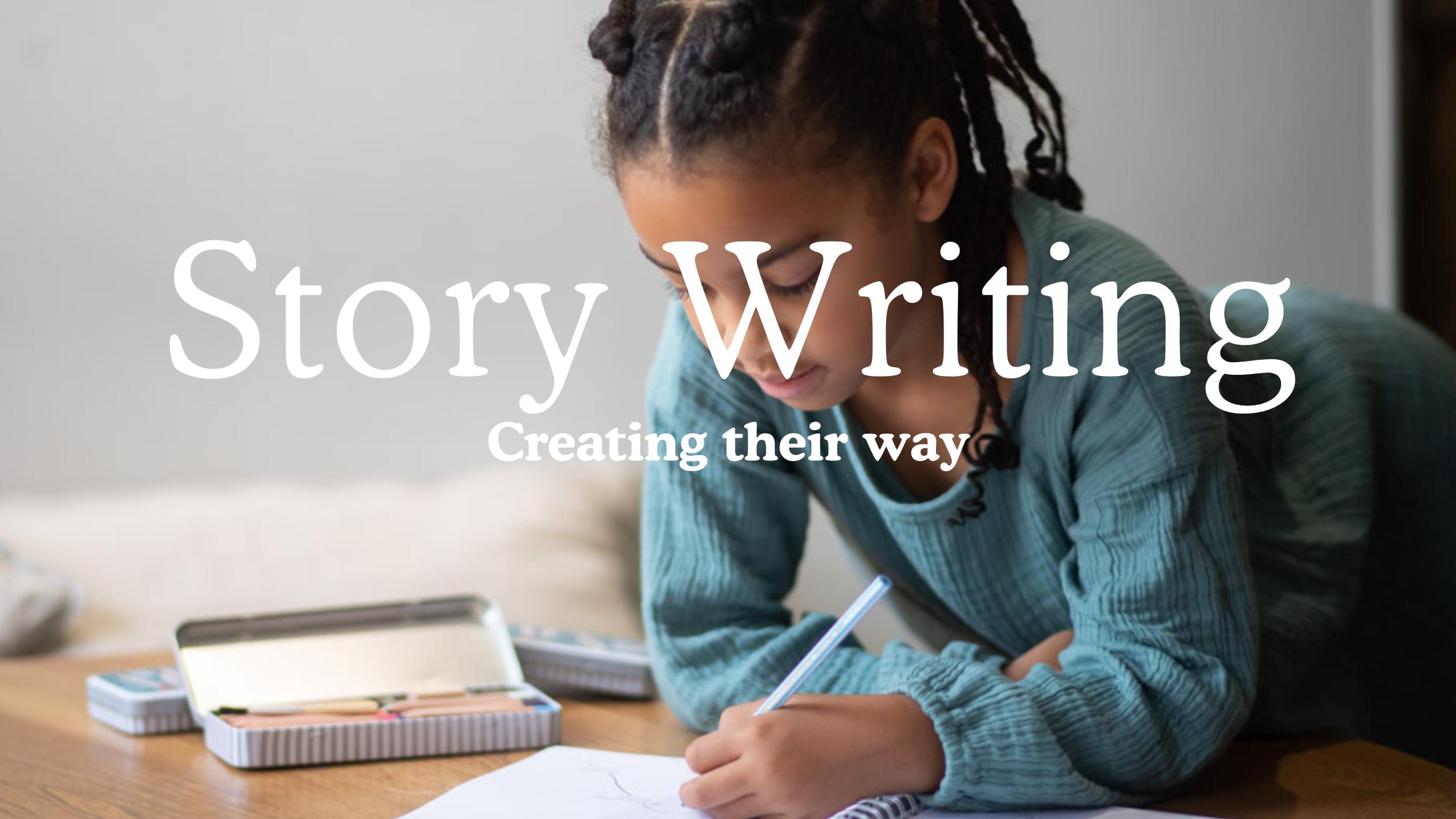 A Child at a desk writing in their storywriter's Book.