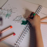 child using watercolour pencils.