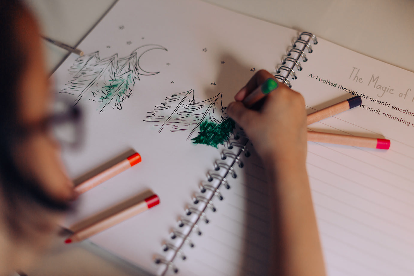 child using watercolour pencils.