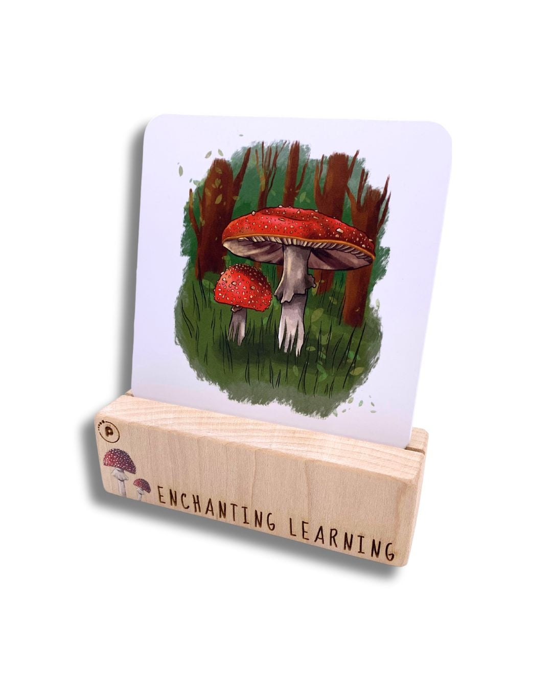 A wooden card block holding the mushroom card.