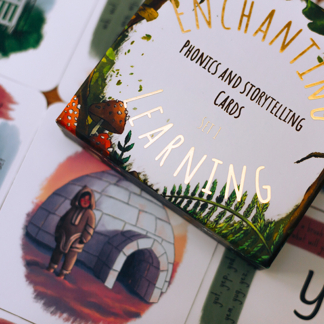 a box of phonics cards with gold foiling.