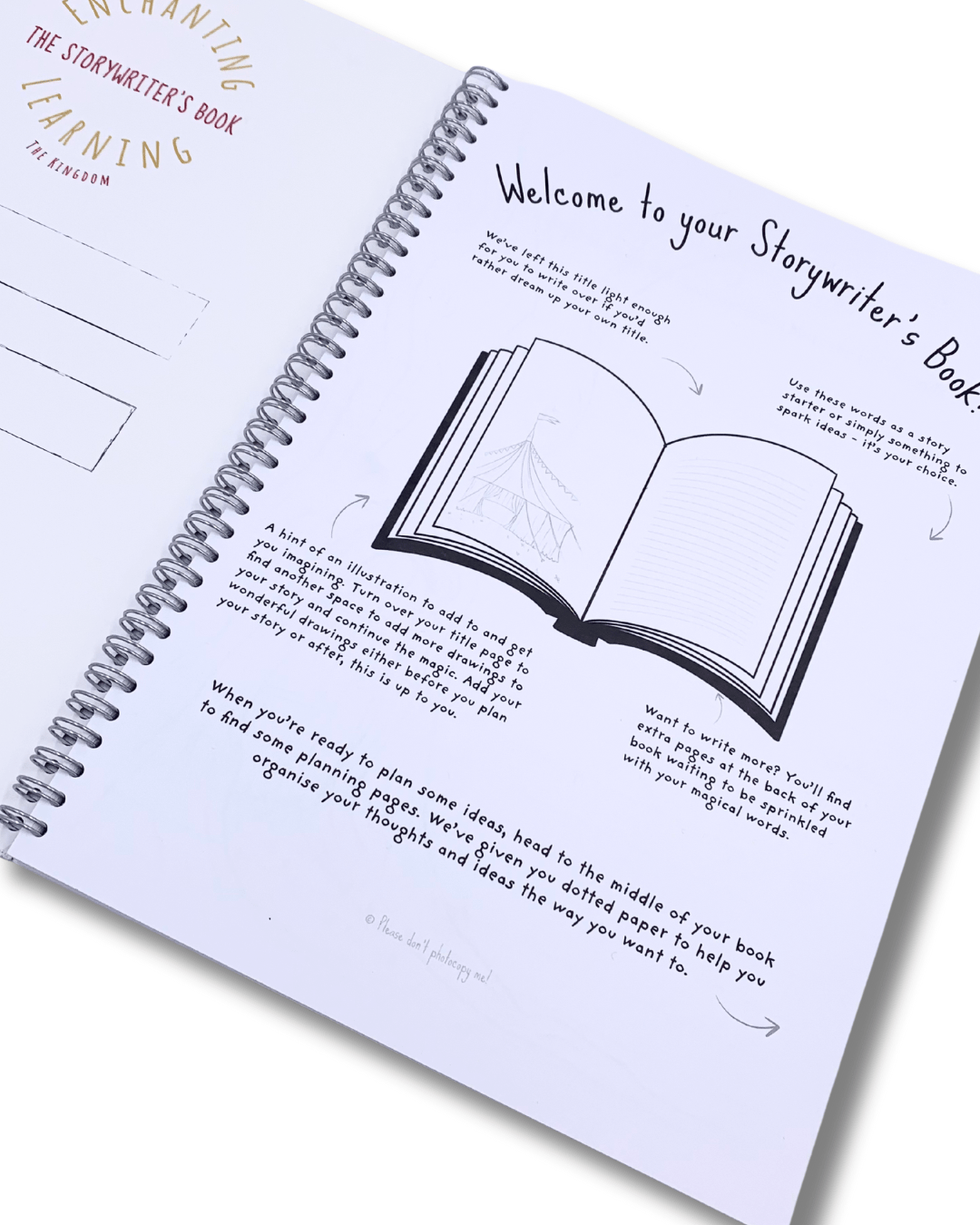 Open story writing book showing the instructions page.