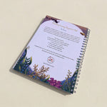 Storywriting book with underwater-themed cover and text on a beige background