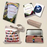 Educational materials including books, a tote bag, and colored pencils on a light background