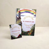 A writing book and some story creator cards on a light background.