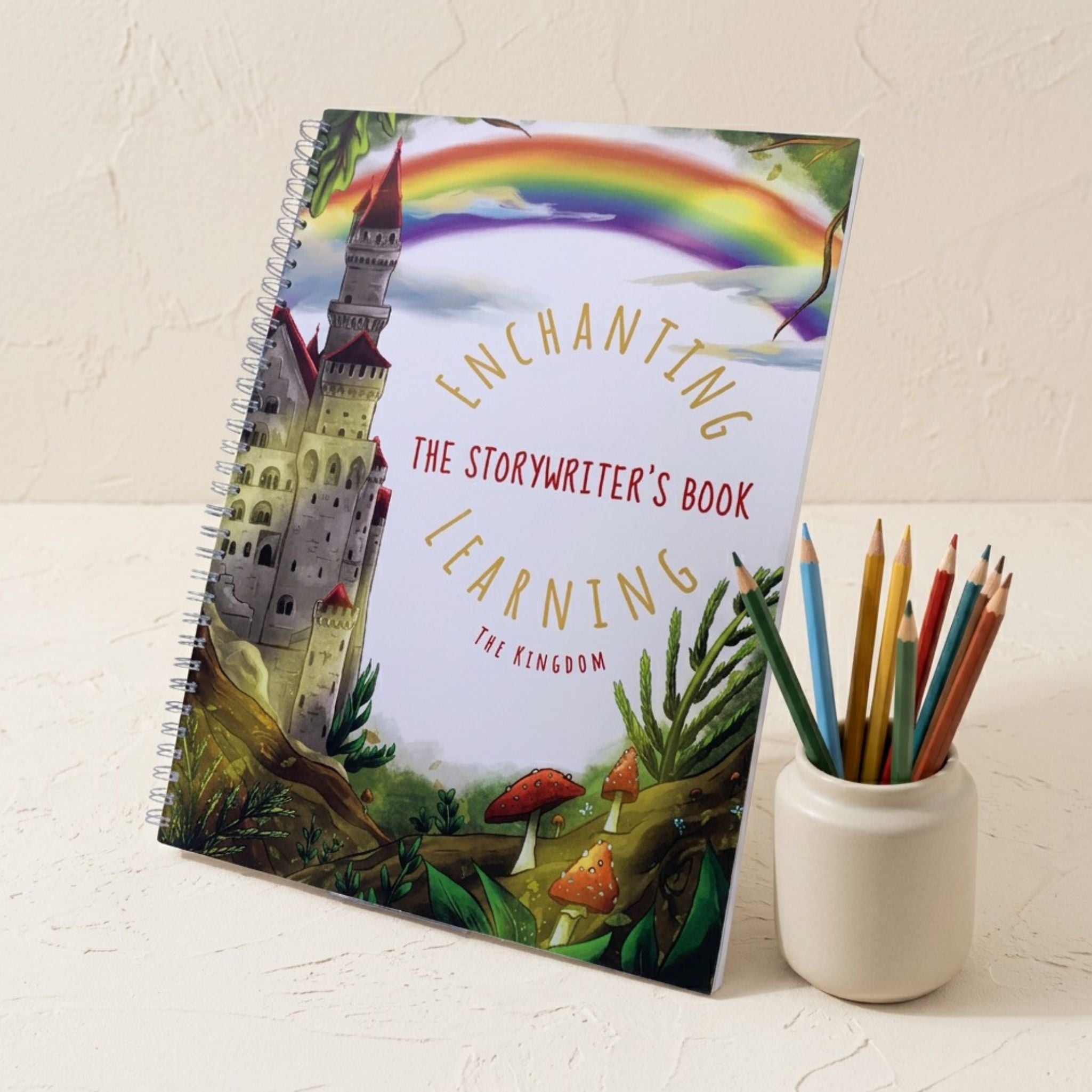 storywriting book with a castle and rainbow illustration on a beige background