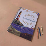 Writing Book titled 'Enchanting Learning' with a lighthouse illustration on a peach background
