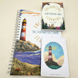 writing book with lighthouse illustration, 'The Storywriter's Book' and 'Enchanting Story Creator Cards' on a beige background