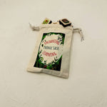 White drawstring pouch for phonics games with text and graphics on a light gray background