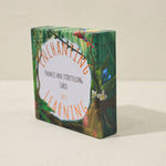 Phonics cards box with 'Enchanting Learning' and jungle-themed design on a beige background