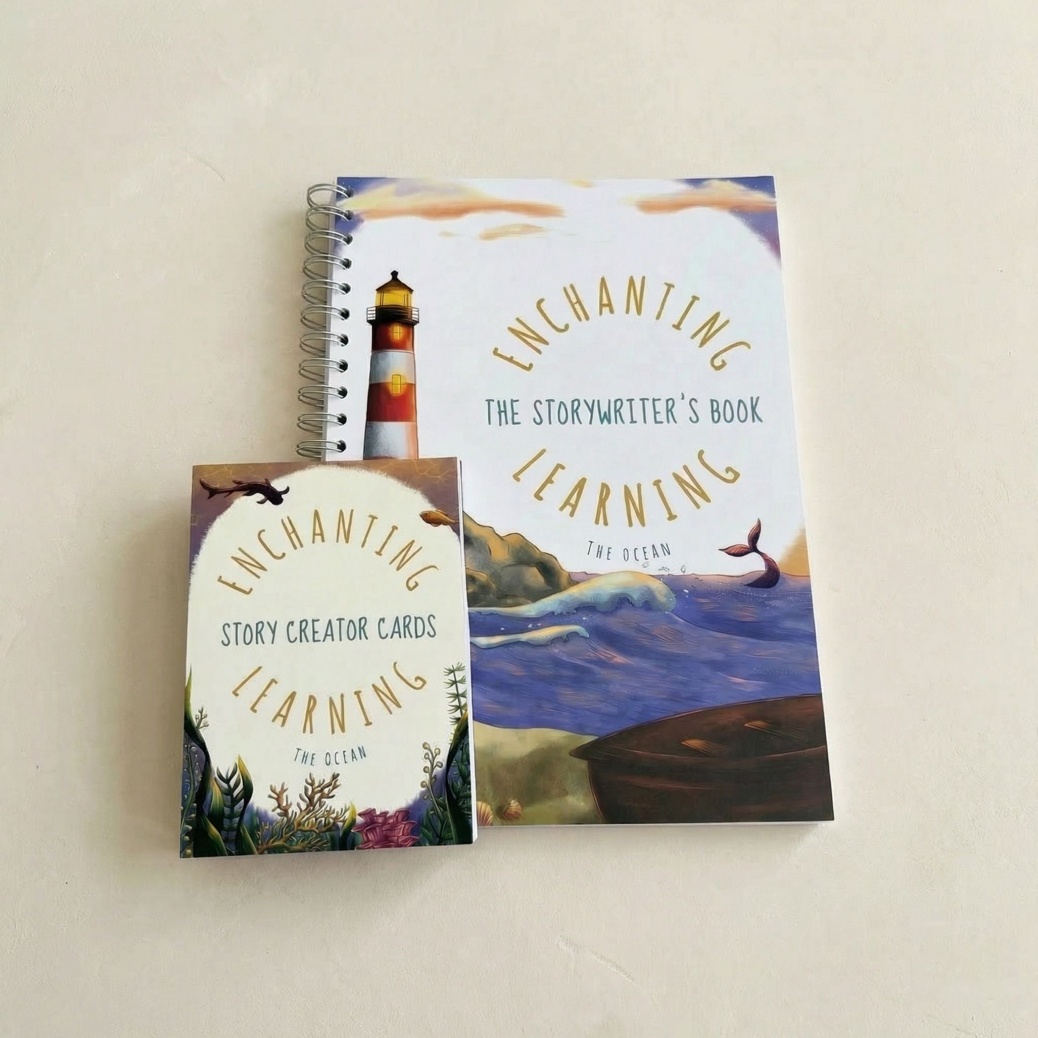 A book titled 'The Storywriter's Book' and ocean themed storytelling cards on a beige background.