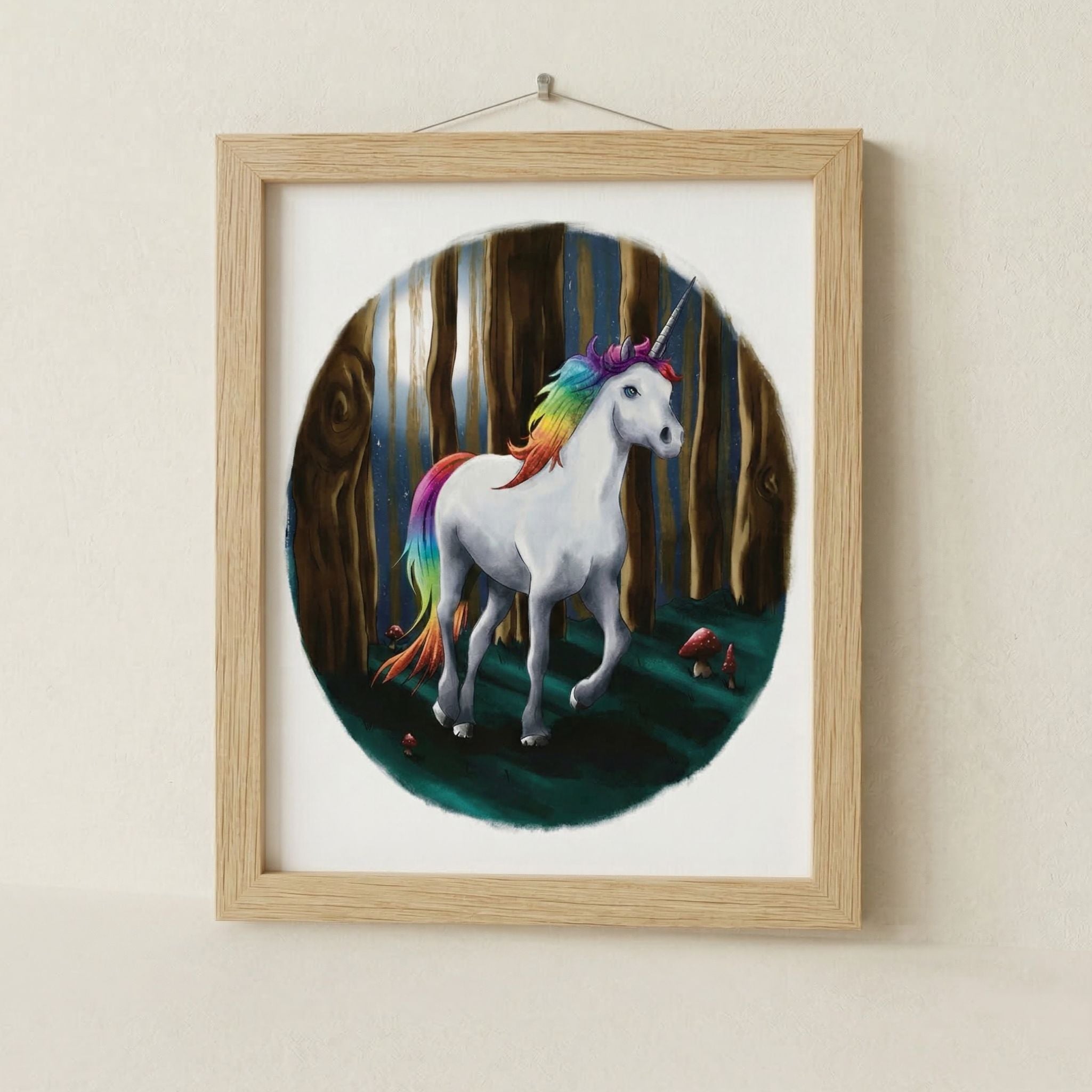 Framed artwork of a unicorn with a rainbow mane and tail in a forest setting.