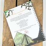 The back cover of The Wild writing book showing a campsite.