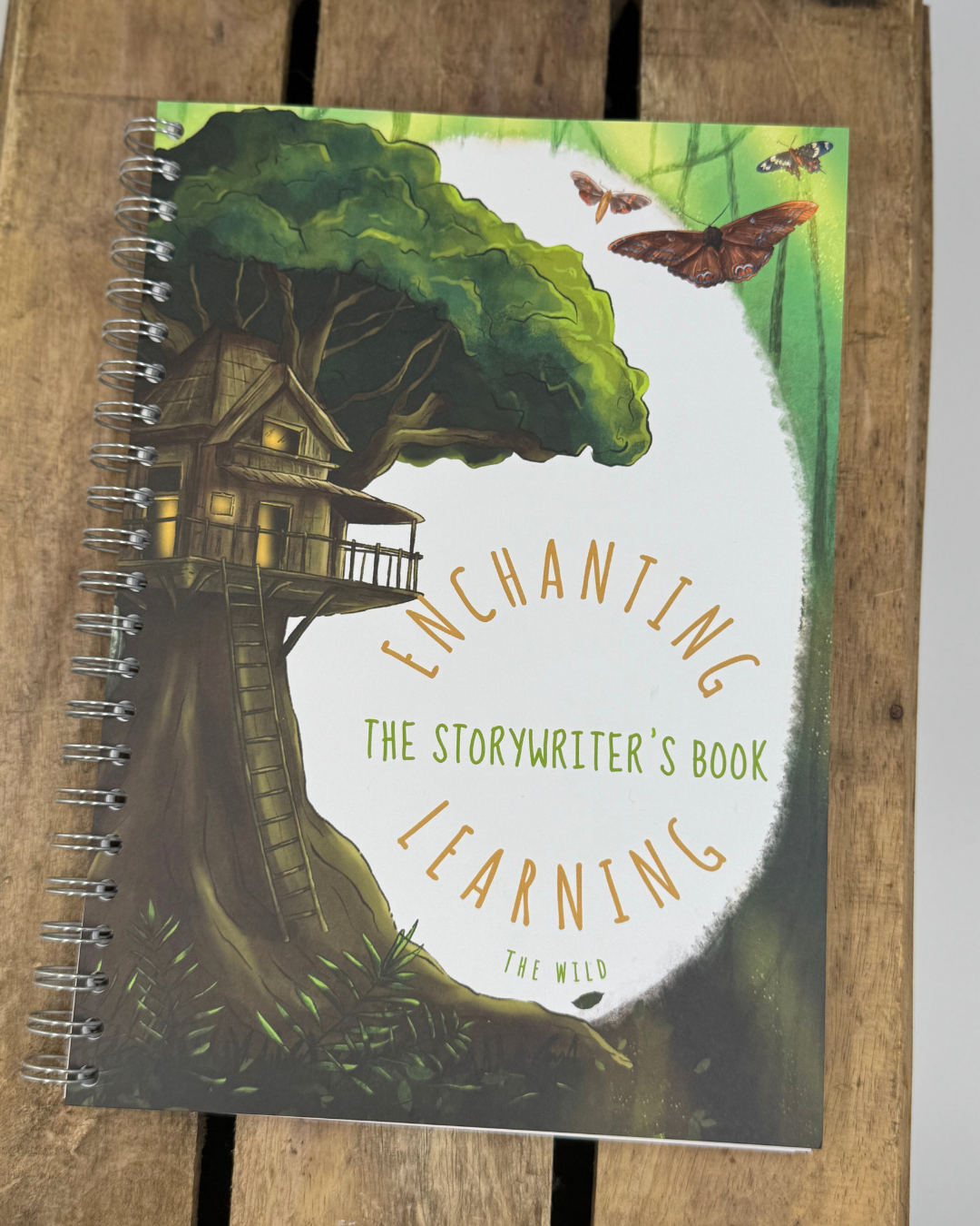 A jungle themed book on a wooden crate.