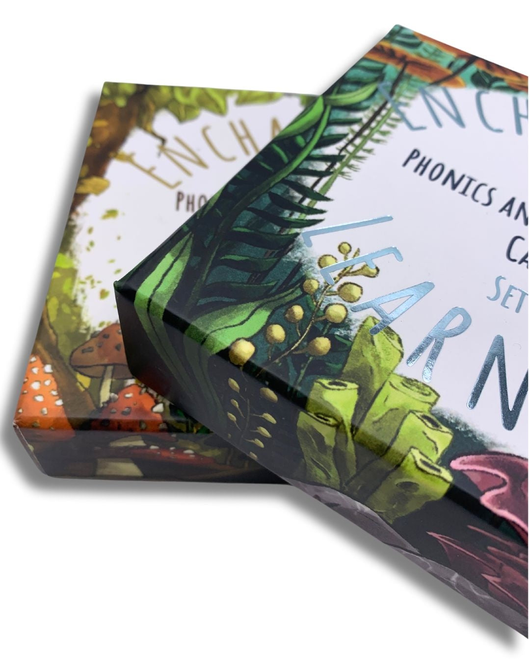 Close up of ocean and woodland themed packaging designs for phonics and storytelling cards.